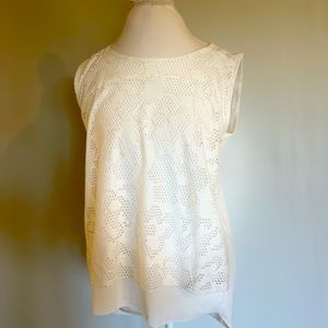 White tunic sleeveless blouse with one button on the back.
